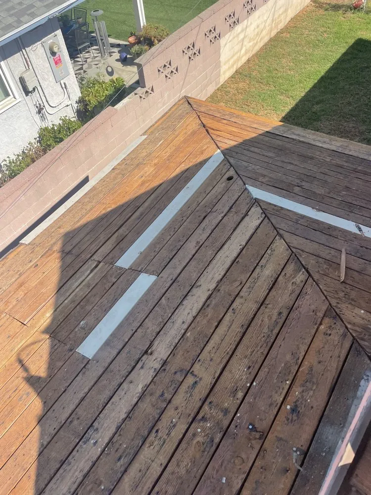 Slide of EZ Roof Repairs