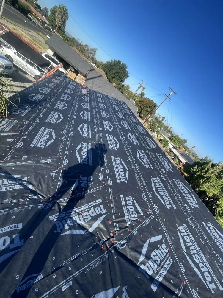 Slide of EZ Roof Repairs