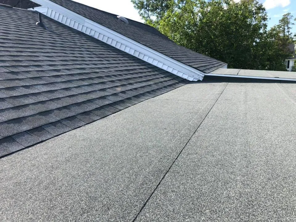 Slide of EZ Roofing