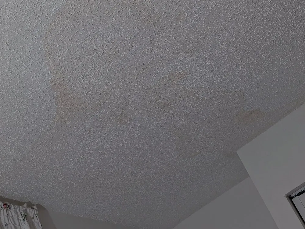 Slide of EZ Roofing of Flagler County