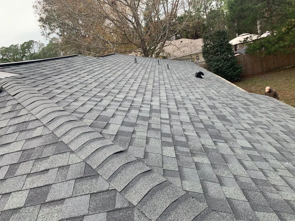 Slide of EZ Roofing of Flagler County