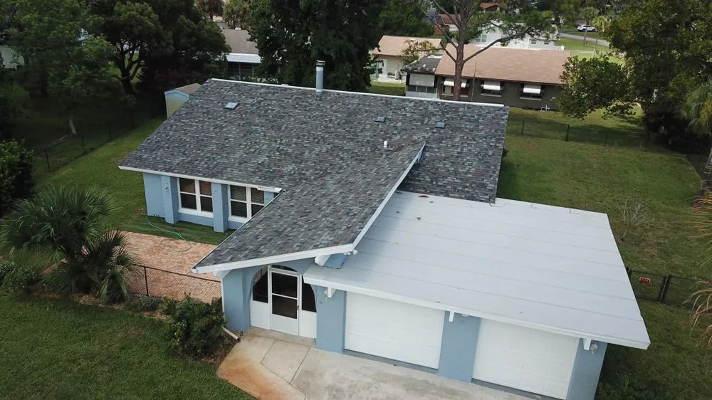 Slide of EZ Roofing of Flagler County