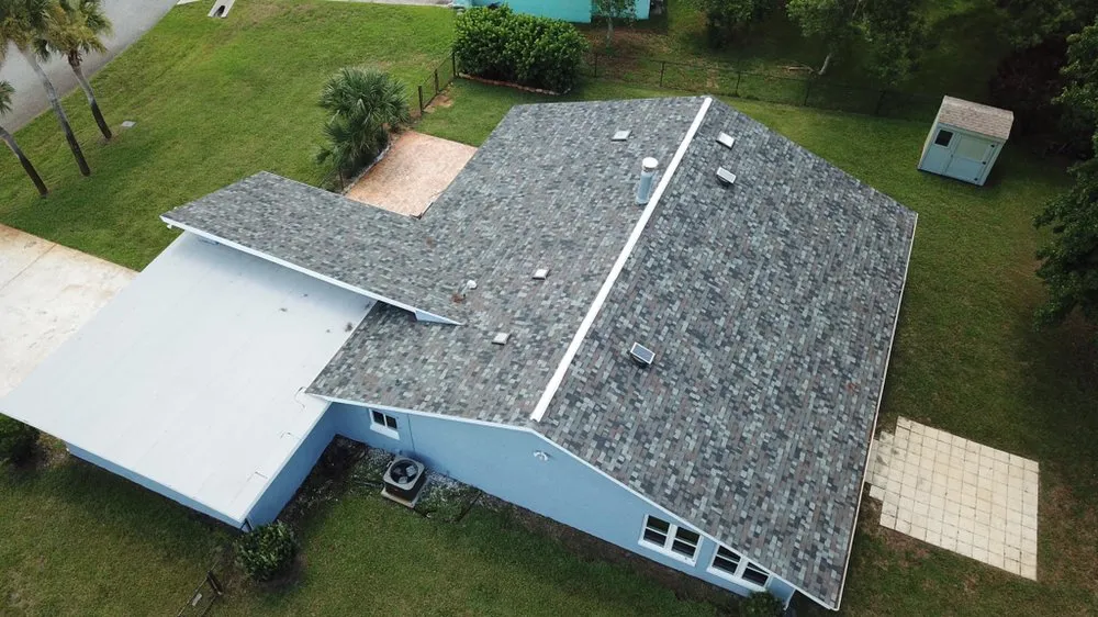 Slide of EZ Roofing of Flagler County