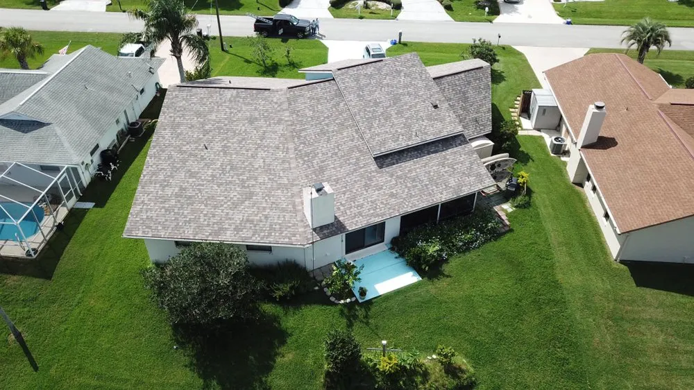 Slide of EZ Roofing of Flagler County