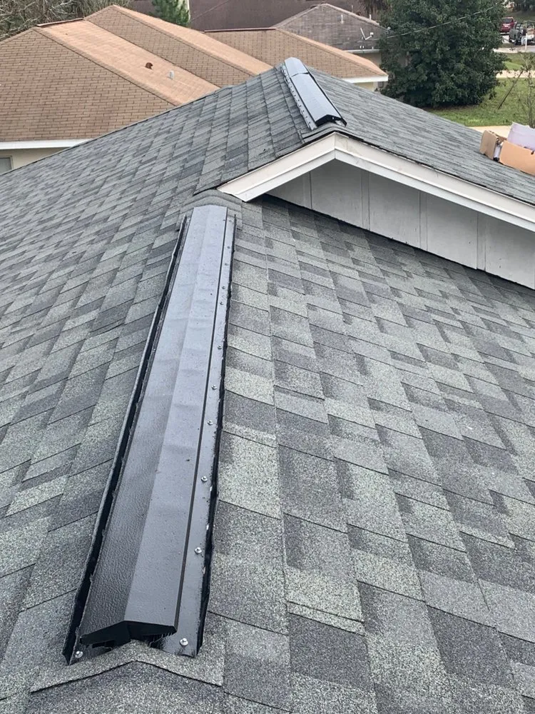 Slide of EZ Roofing of Flagler County