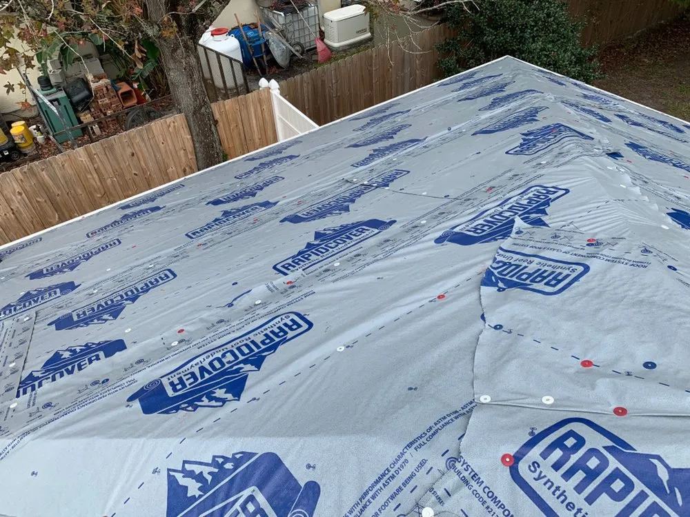 Slide of EZ Roofing of Flagler County