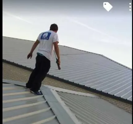 Slide of Ezell’s Roofing & Construction