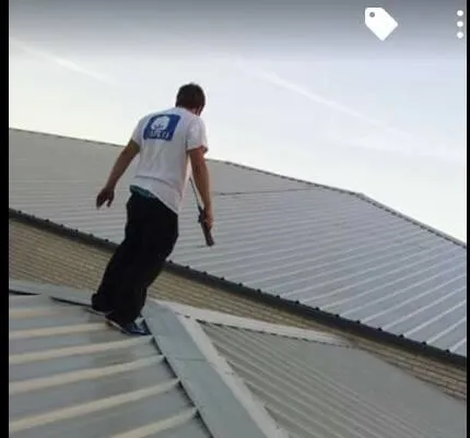 Slide of Ezell’s Roofing & Construction