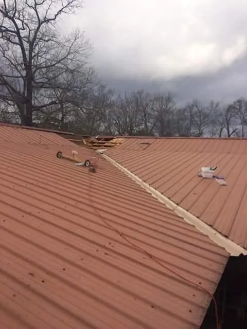 Slide of Ezell’s Roofing & Construction