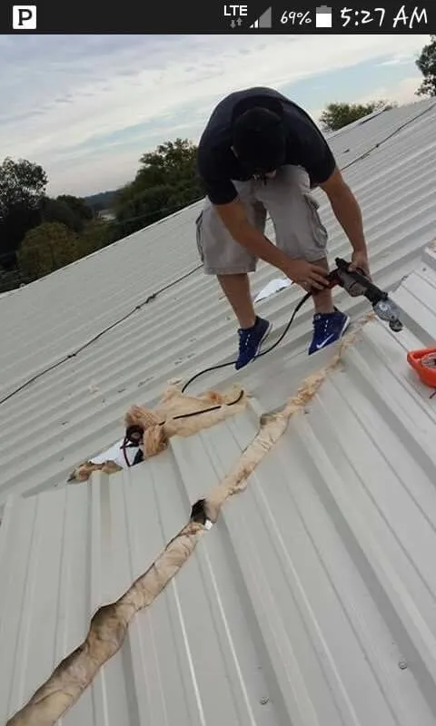 Slide of Ezell’s Roofing & Construction