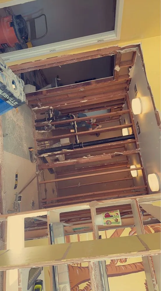 Slide of Ezell’s Roofing & Construction