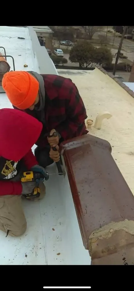 Slide of Ezell’s Roofing & Construction