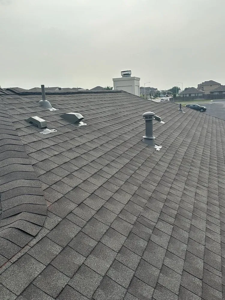 Slide of EZS Roofing & Construction