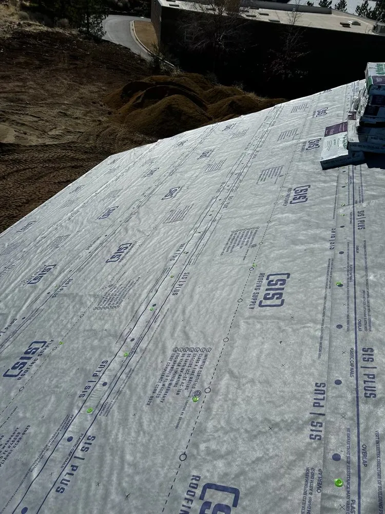 Slide of F E Roofing