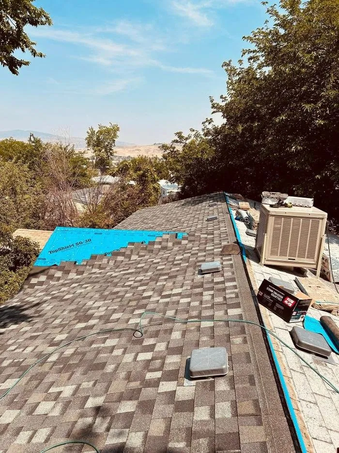 Slide of F E Roofing