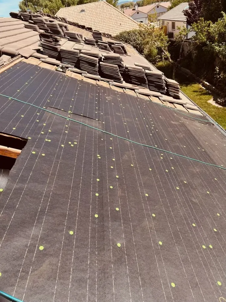 Slide of F E Roofing