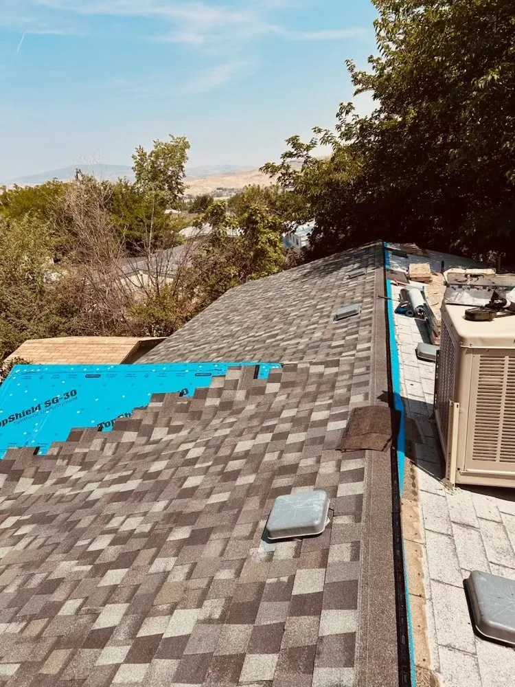 Slide of F E Roofing