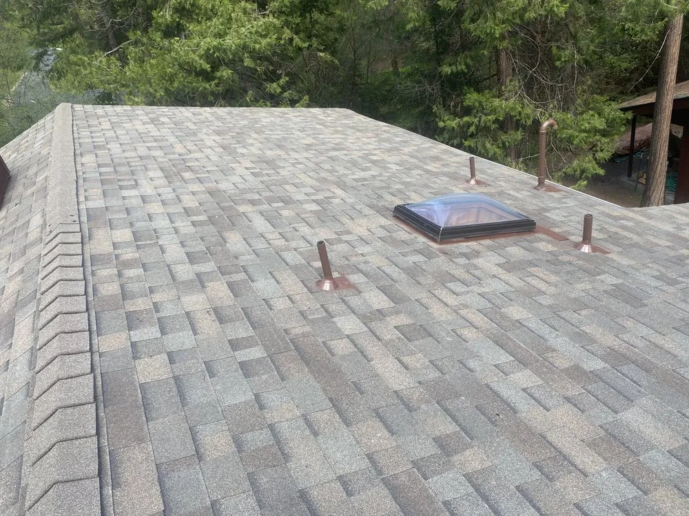 Slide of F M Quality Roofing