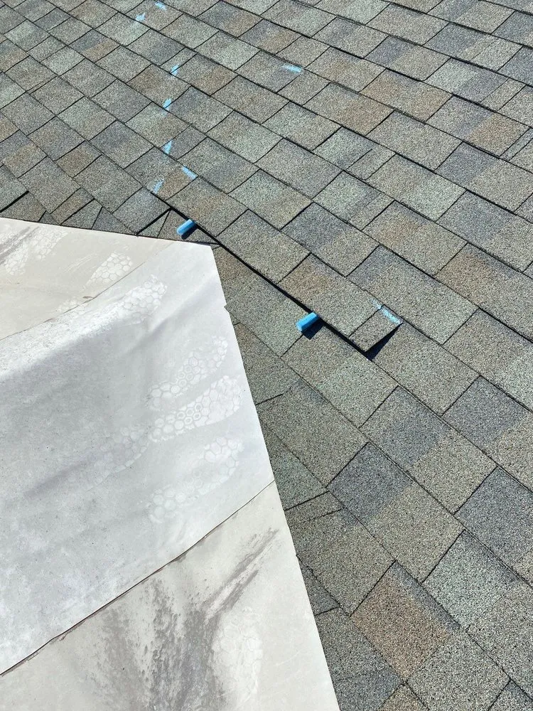 Slide of Faile Roofing