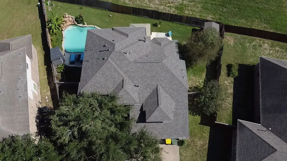 Licensed storm damage roof repair for residential properties across Huffman, TX - Falcon Roofing & Construction