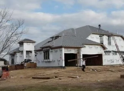 Emergency storm damage roof repair for residential properties in Huffman, TX by Falcon Roofing & Sheet Metal
