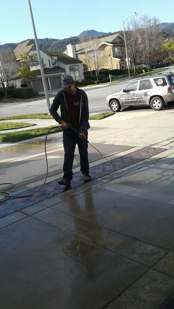 Slide of Falcon Roofing