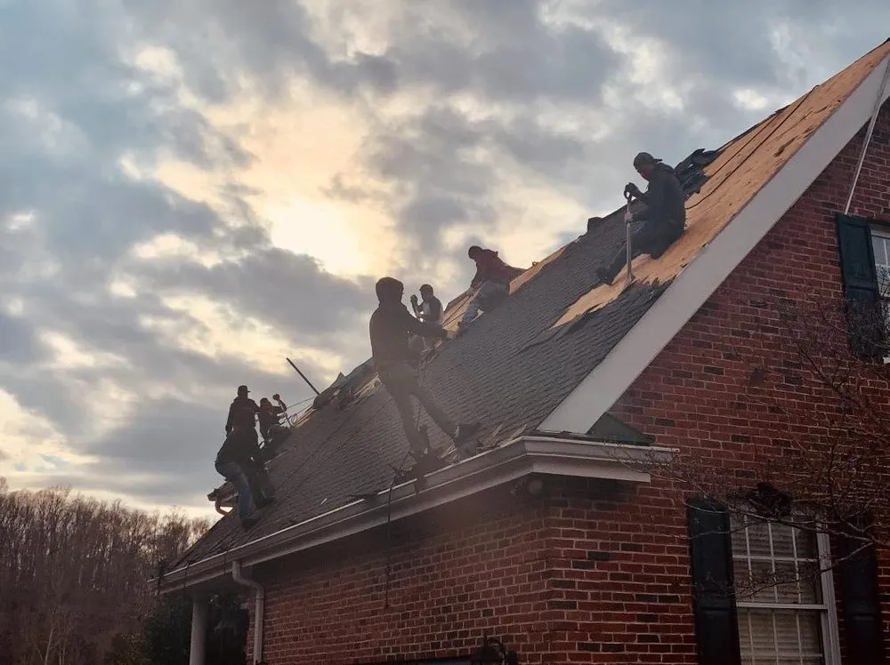 Slide of Falcon Roofing