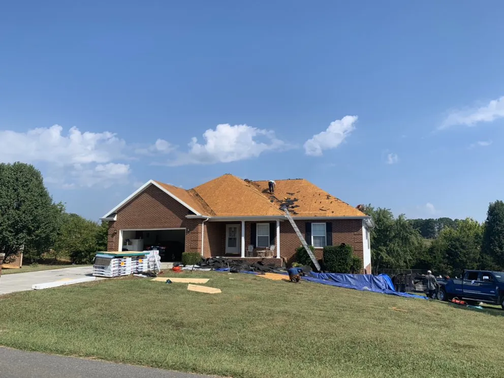 Slide of Falcon Roofing