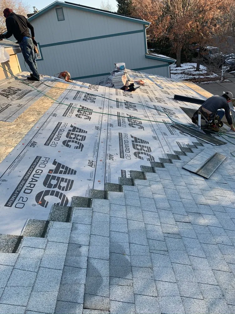 Slide of Falcon's Eye Roofing & Construction