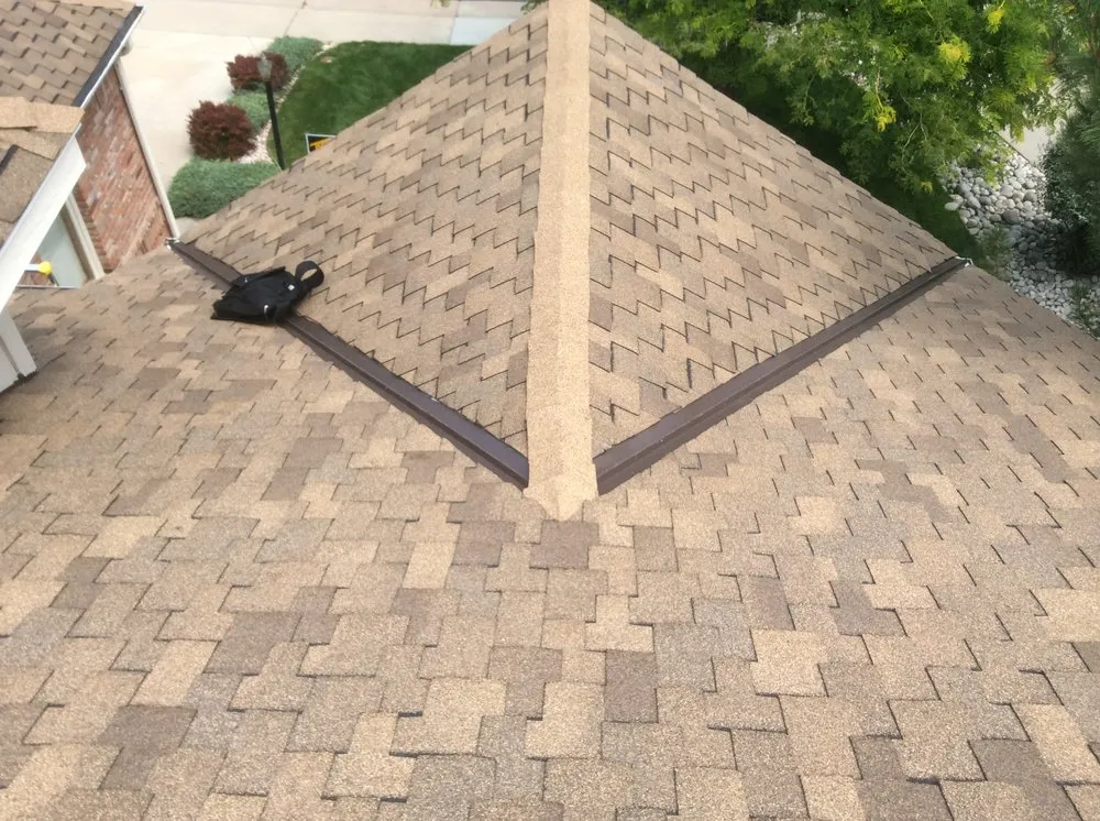 Slide of Falcon's Eye Roofing & Construction