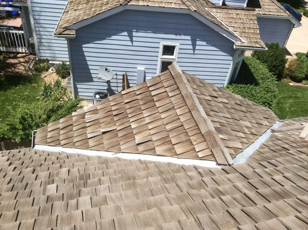 Slide of Falcon's Eye Roofing & Construction