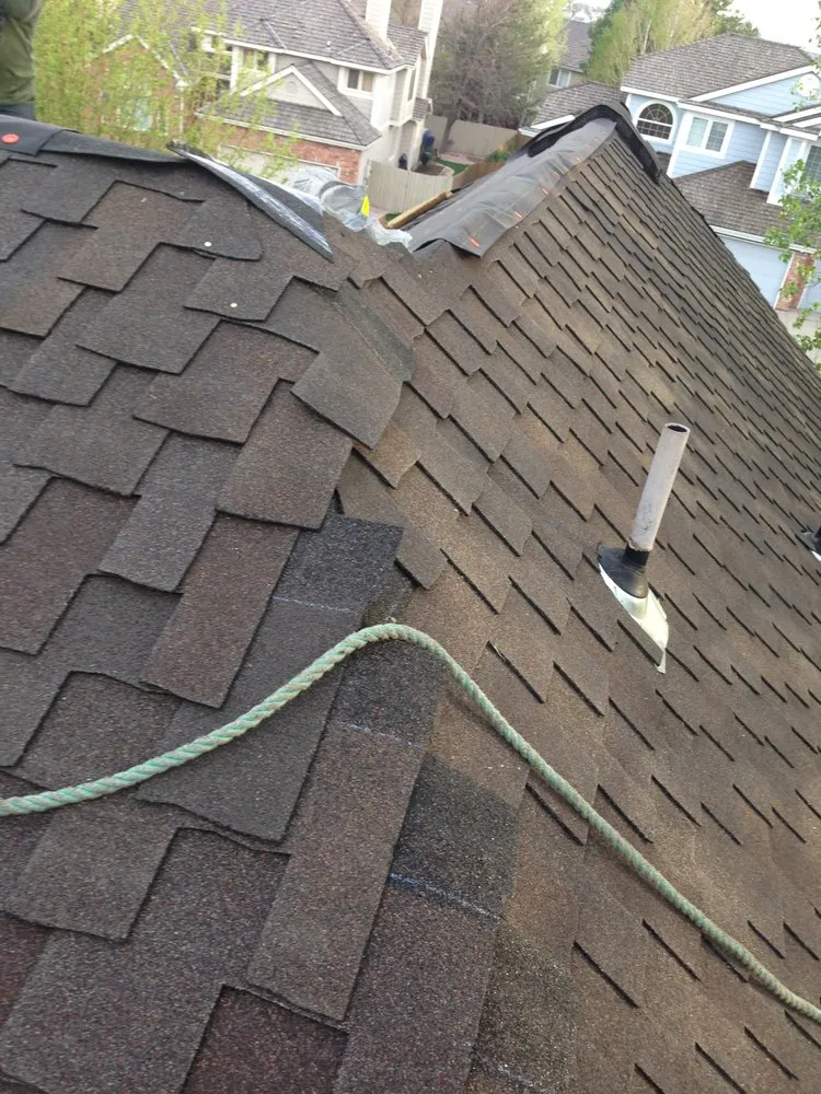 Slide of Falcon's Eye Roofing & Construction