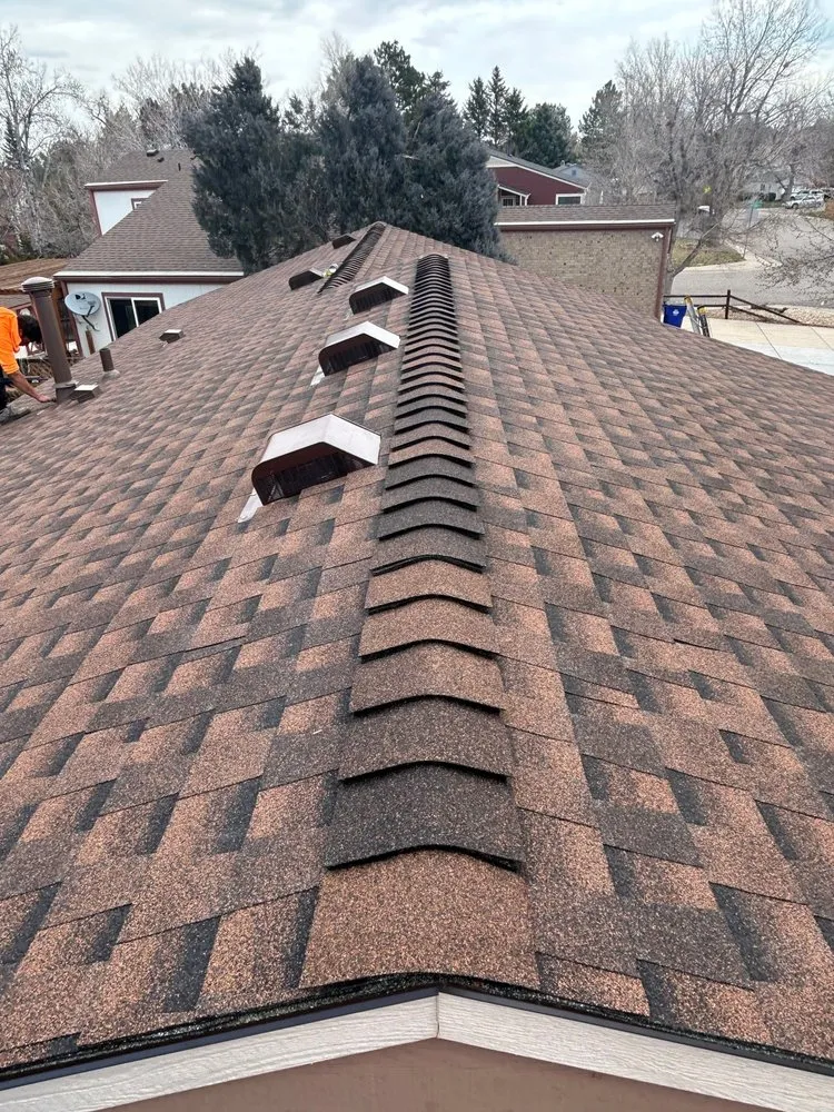 Slide of Falcon's Eye Roofing & Construction