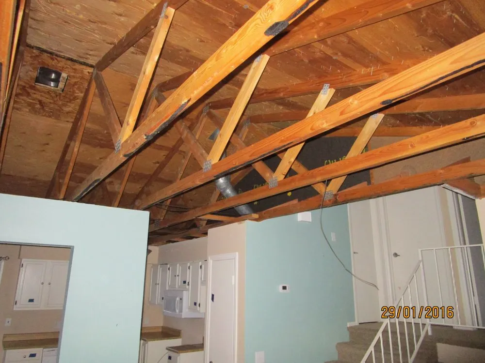 Slide of Falcon's Eye Roofing & Construction