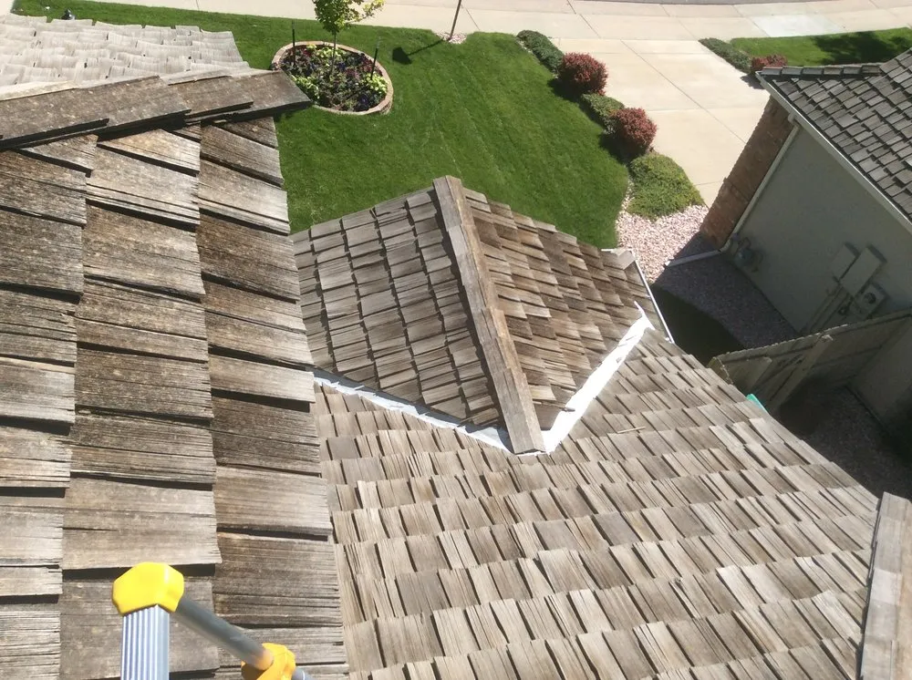 Slide of Falcon's Eye Roofing & Construction