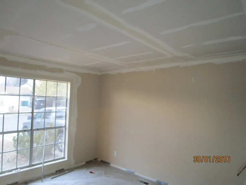 Slide of Falcon's Eye Roofing & Construction