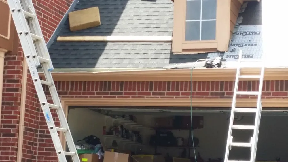 Slide of FAM Roofing