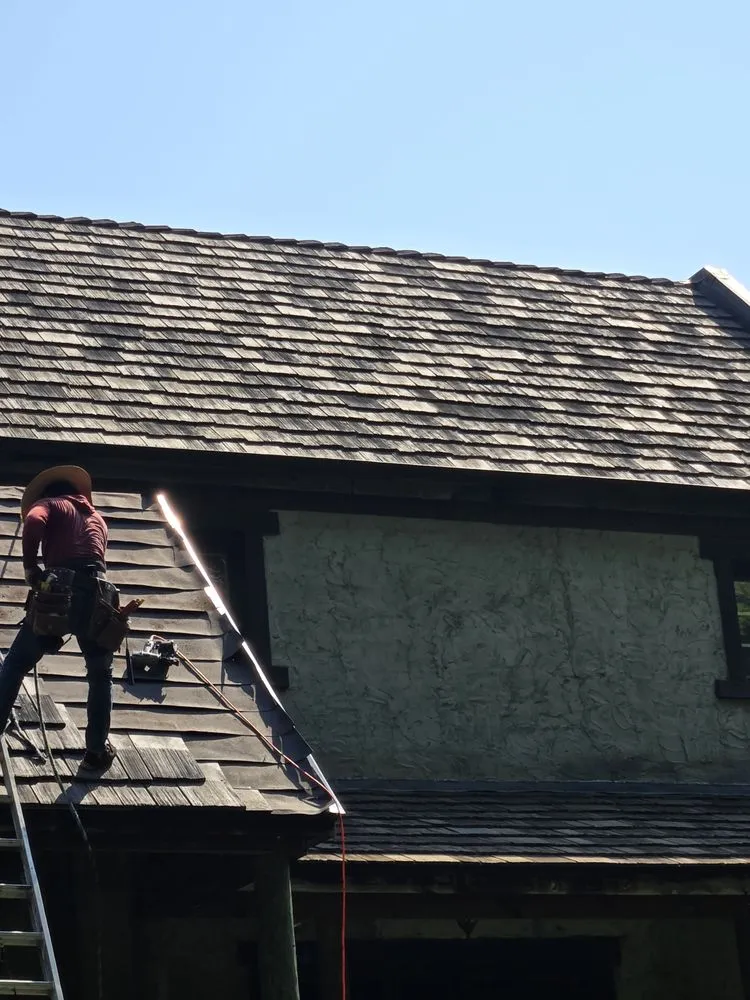 Slide of FAM Roofing