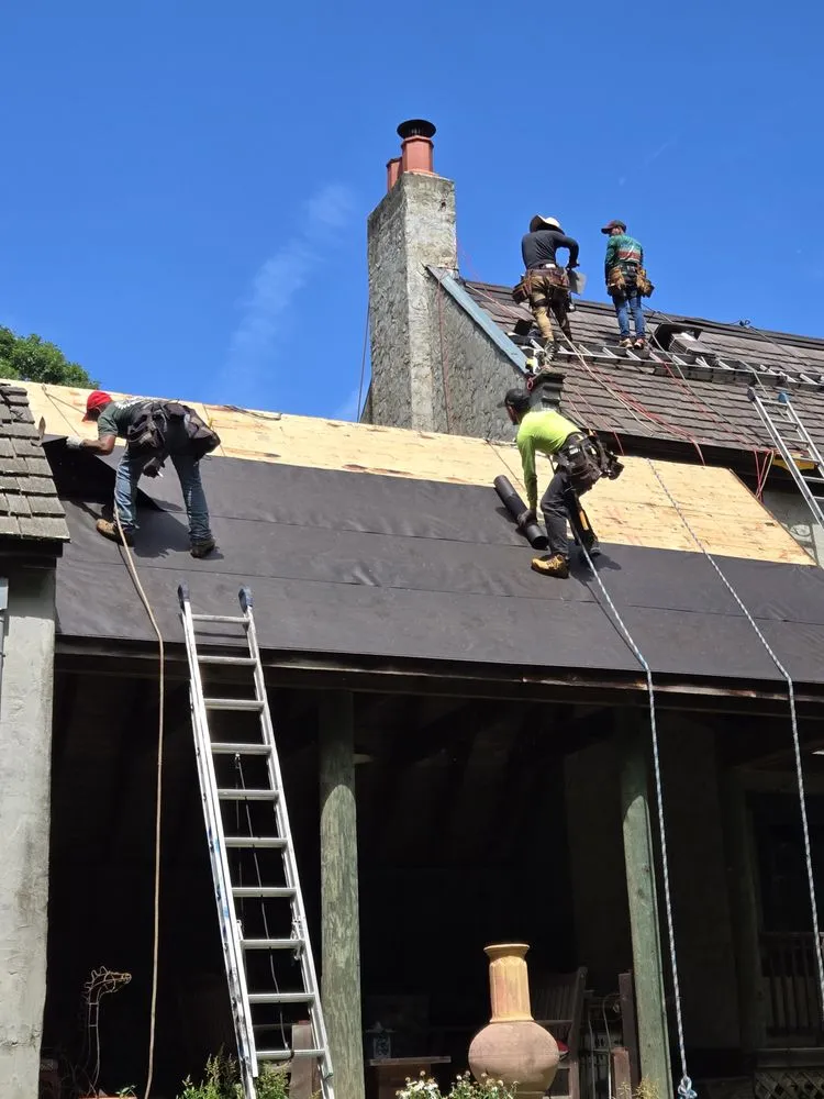 Slide of FAM Roofing