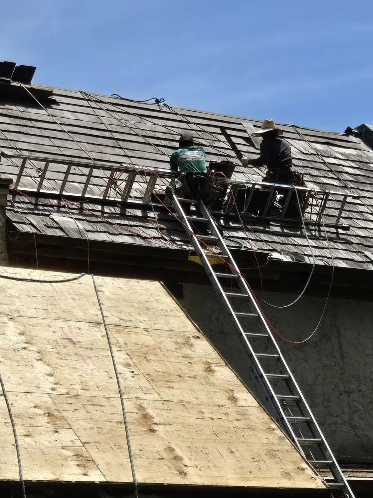 Slide of FAM Roofing