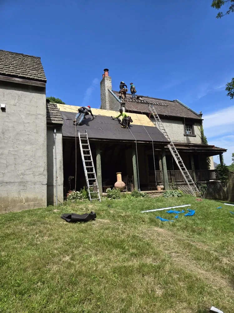 Slide of FAM Roofing