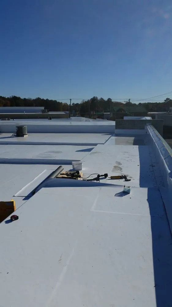 Slide of FAM Roofing