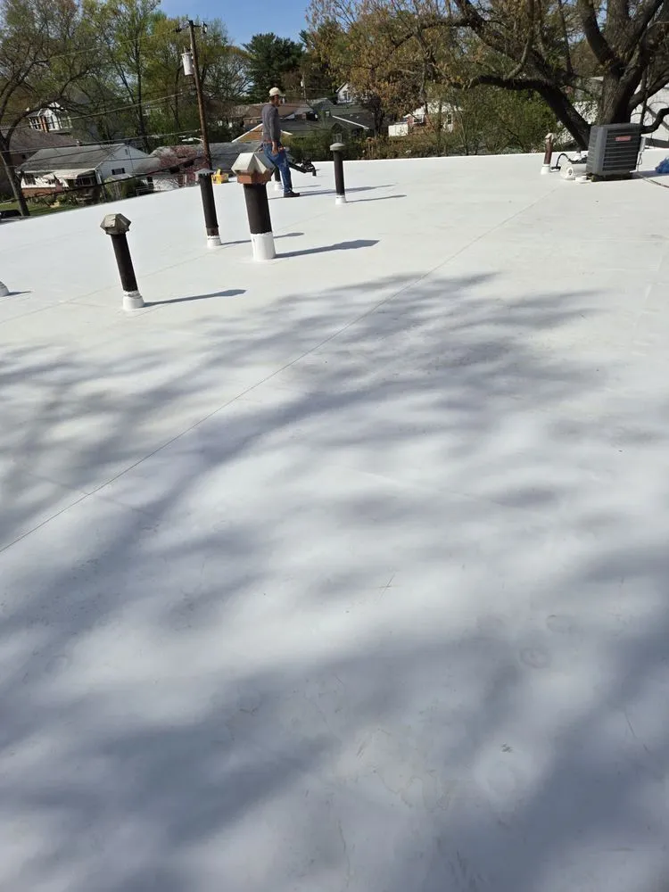 Slide of FAM Roofing