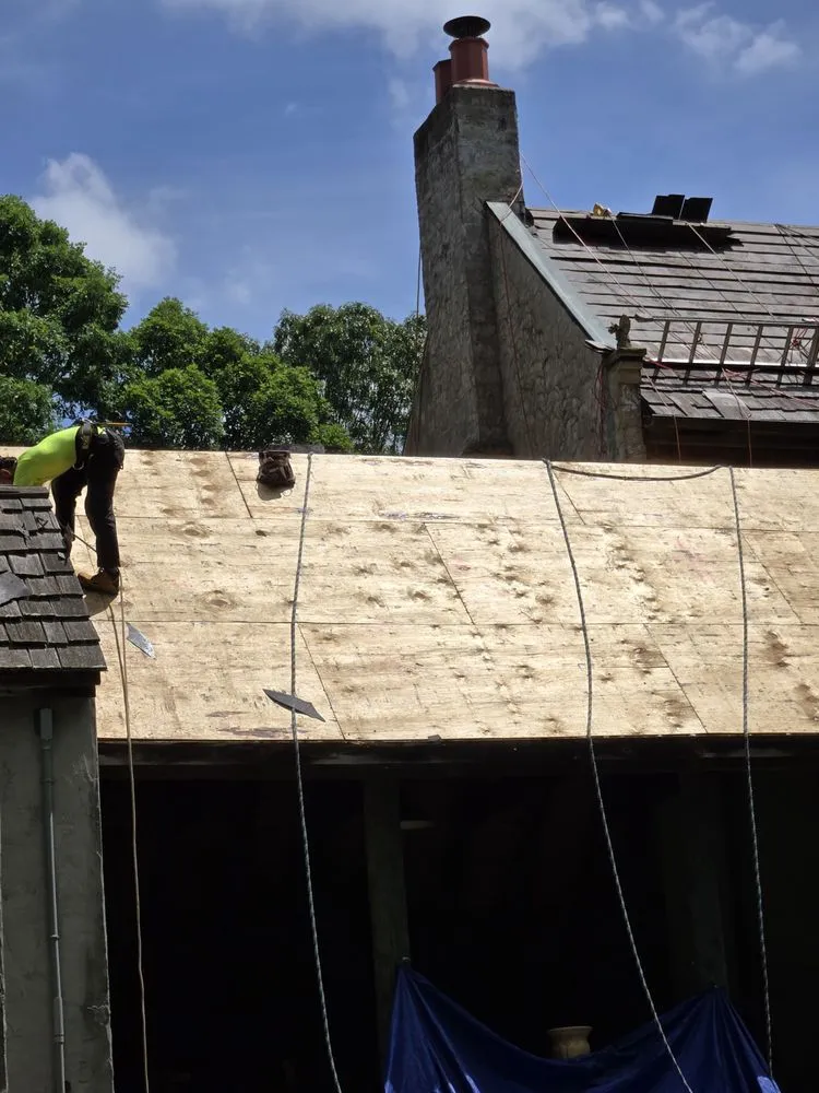 Slide of FAM Roofing