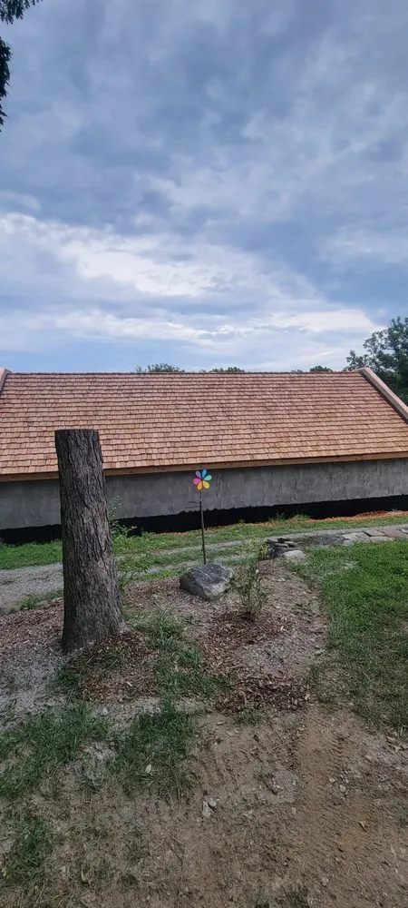 Slide of FAM Roofing