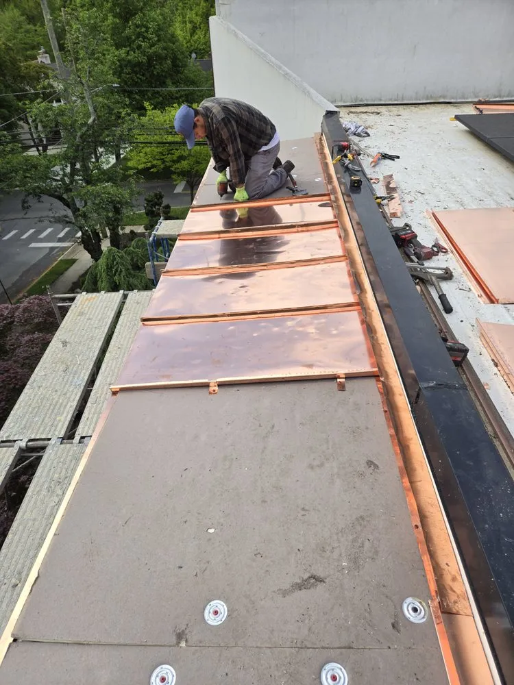 Slide of FAM Roofing