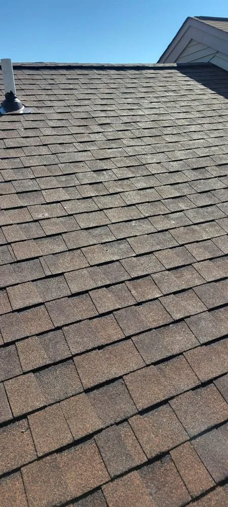 Slide of FAM Roofing