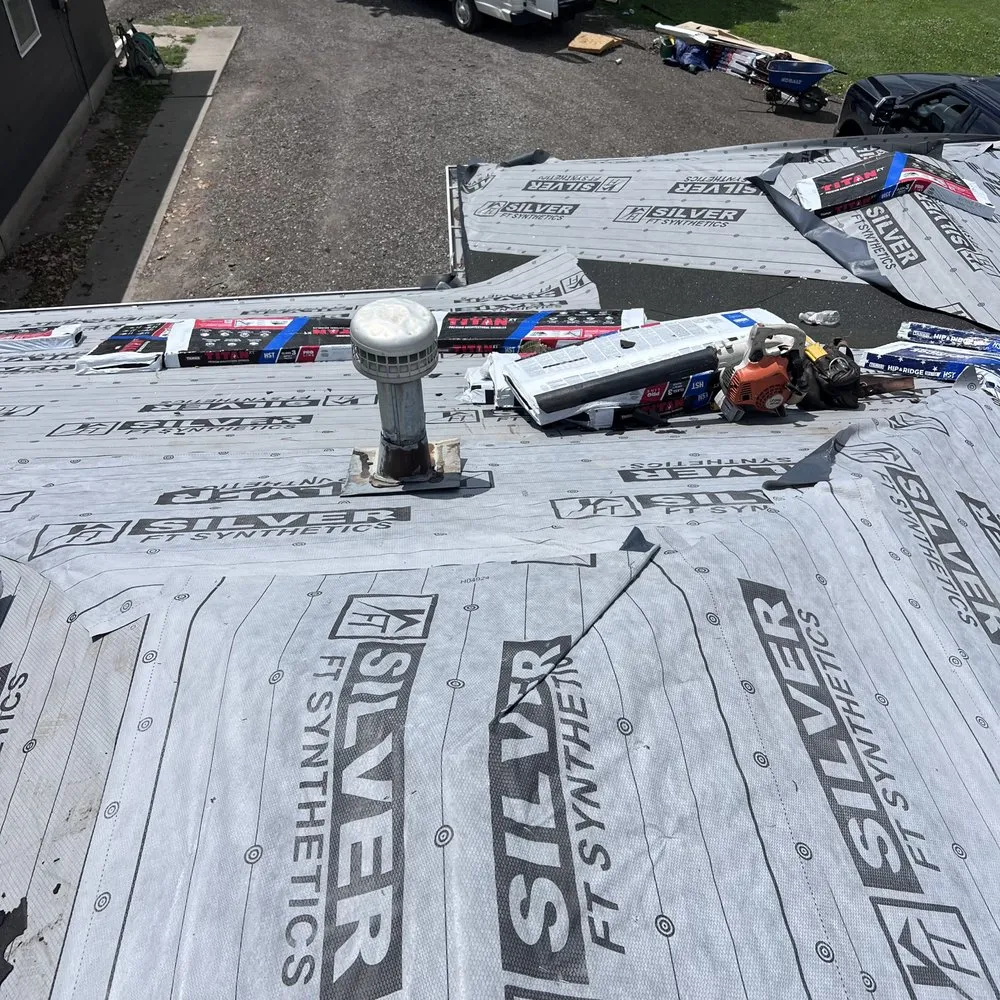 Slide of Family Construction Roofing