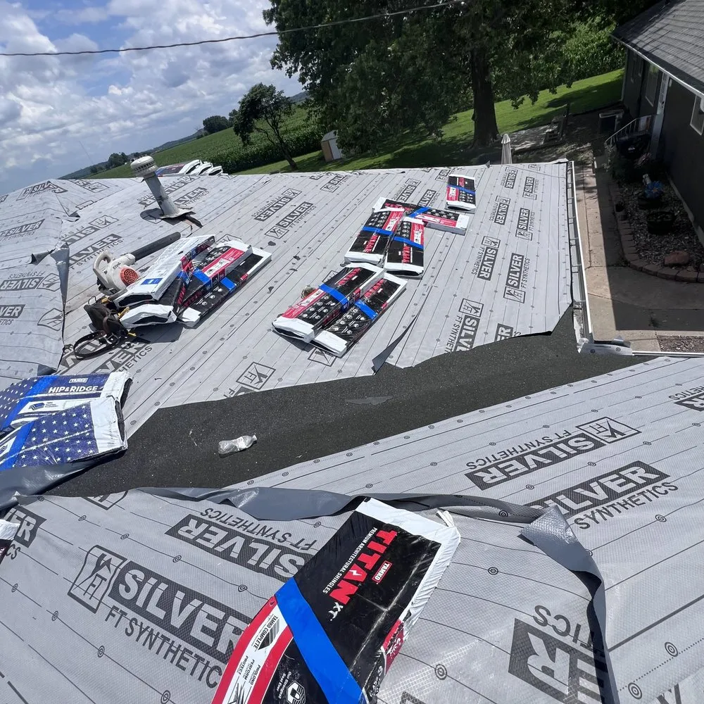 Slide of Family Construction Roofing