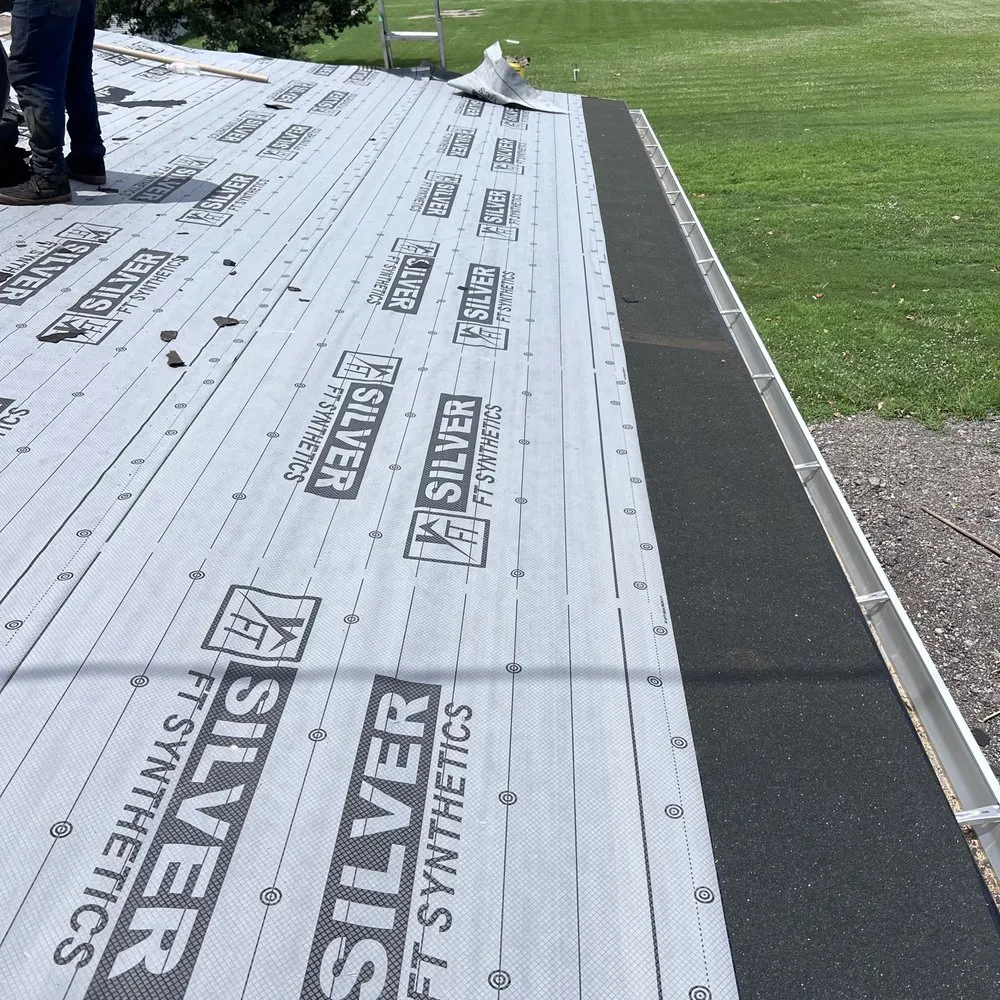 Slide of Family Construction Roofing